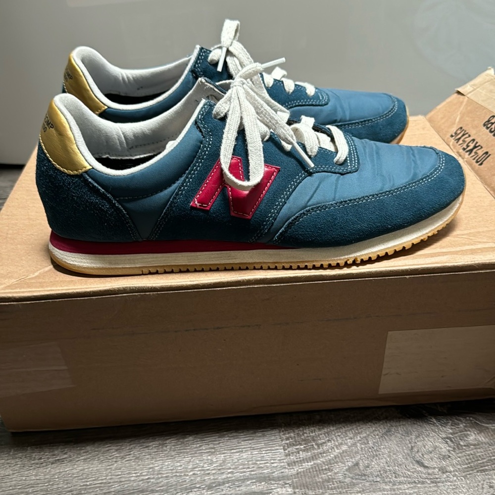 Men’s New Balance comp 100